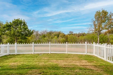 front view of a house and a yard