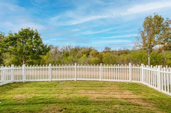 front view of a house and a yard