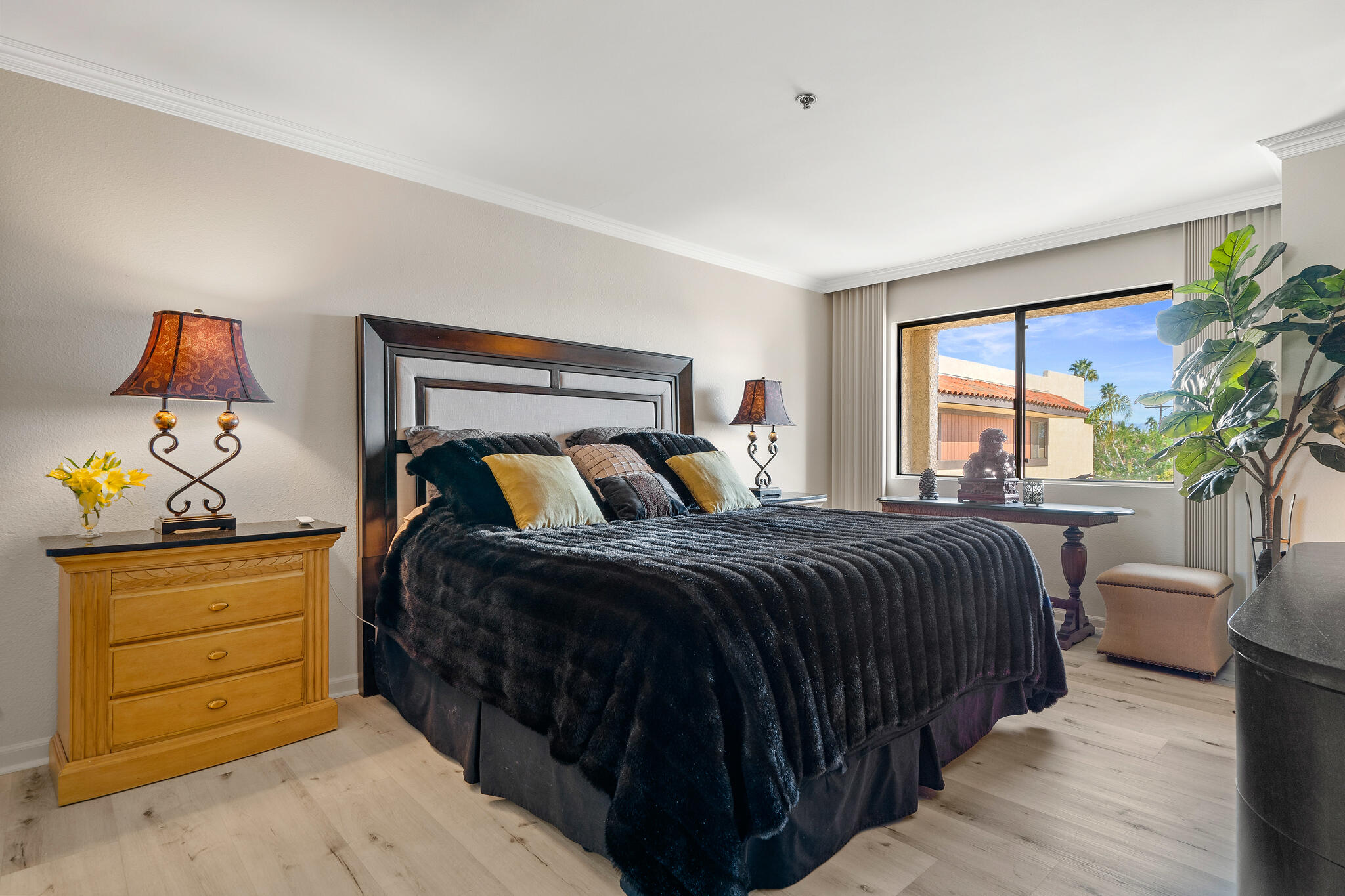 200 East Racquet Club Road, Unit 54 Palm Springs, CA 92262 - Photo 16 of 29 a bedroom with a bed and window