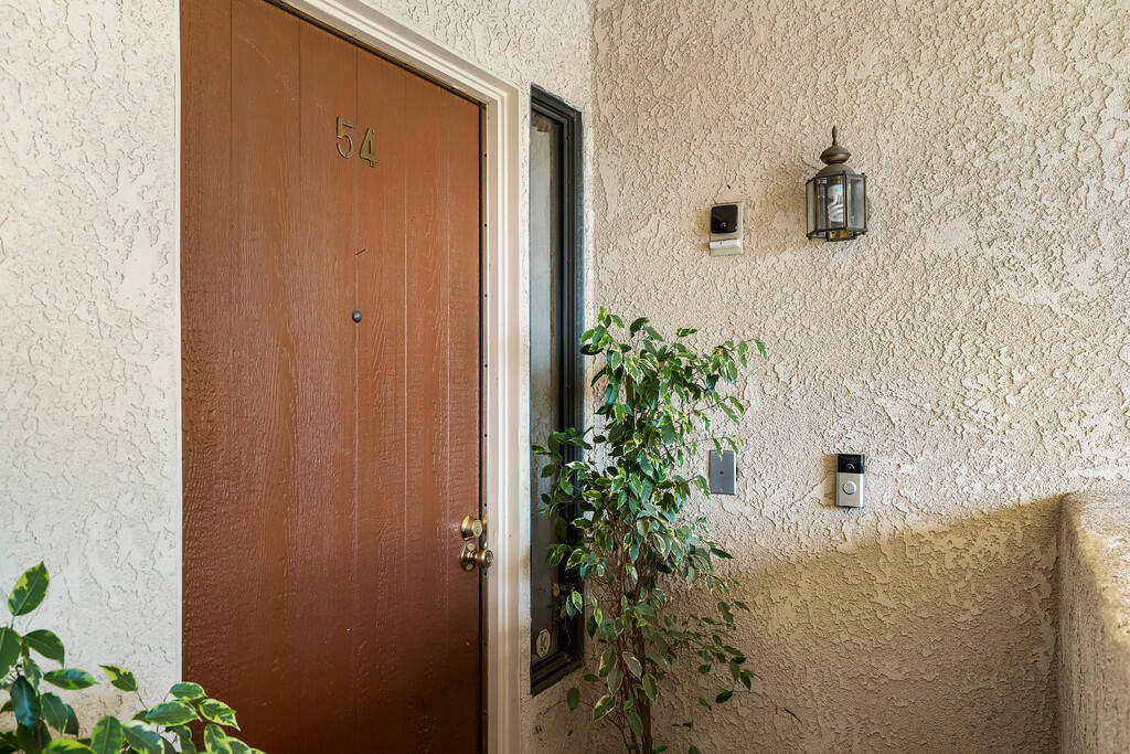 200 East Racquet Club Road, Unit 54 Palm Springs, CA 92262 - Photo 2 of 29 a bathroom with a shower