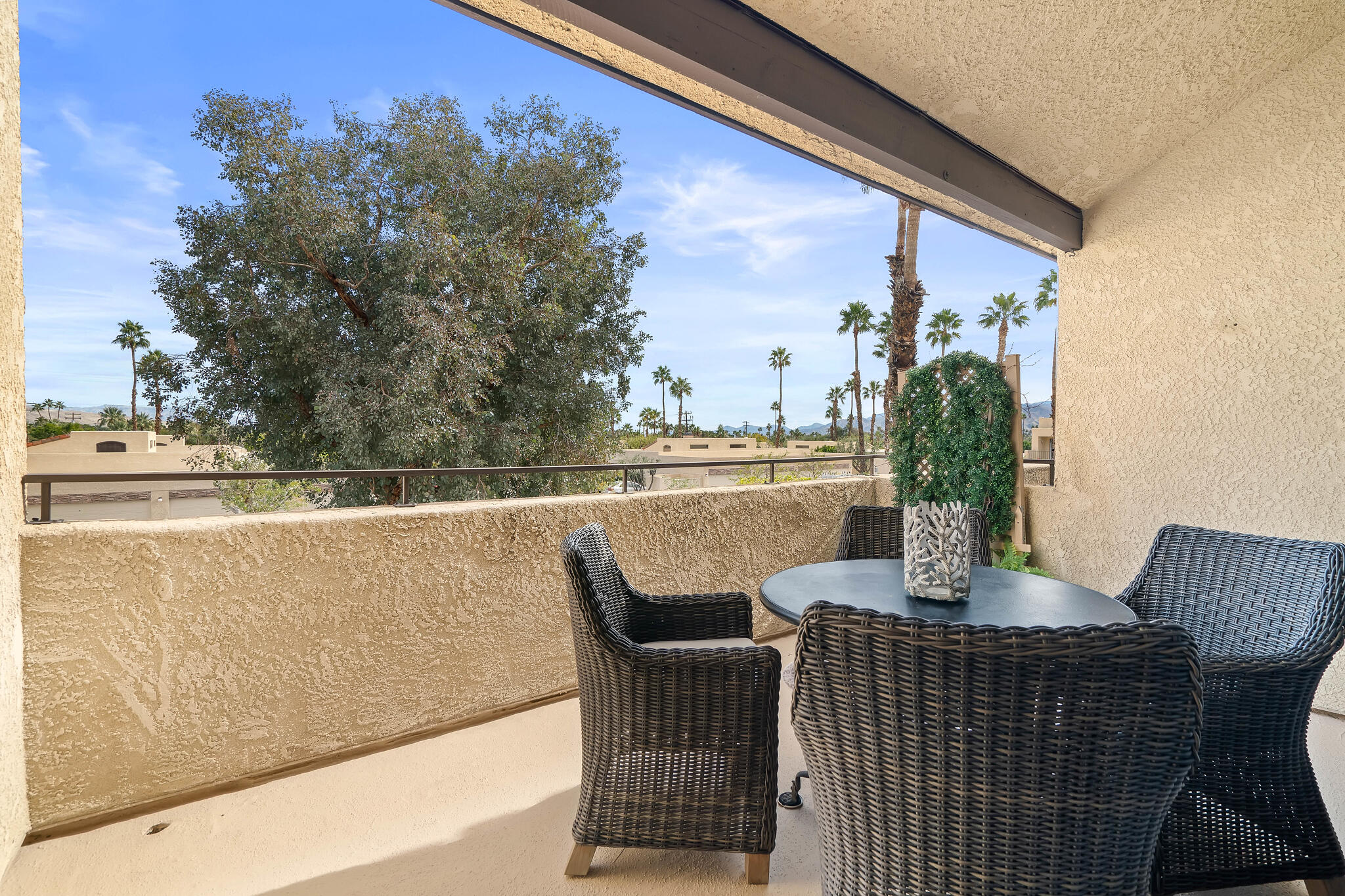 200 East Racquet Club Road, Unit 54 Palm Springs, CA 92262 - Photo 21 of 29 a view of balcony and patio