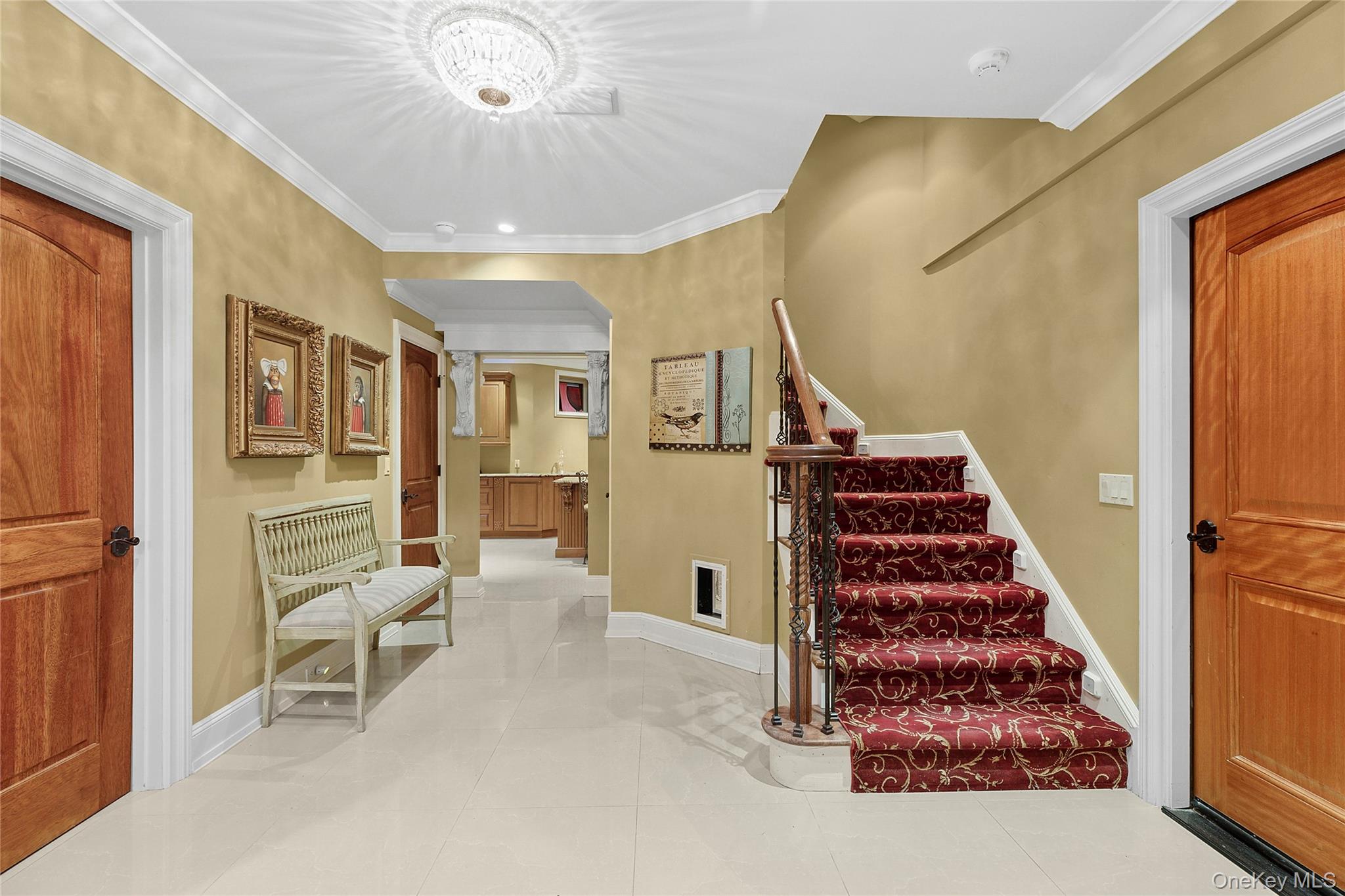 5 Schoolhouse Court Oyster Bay, NY 11771 - Photo 22 of 33 a living room with furniture and a large window