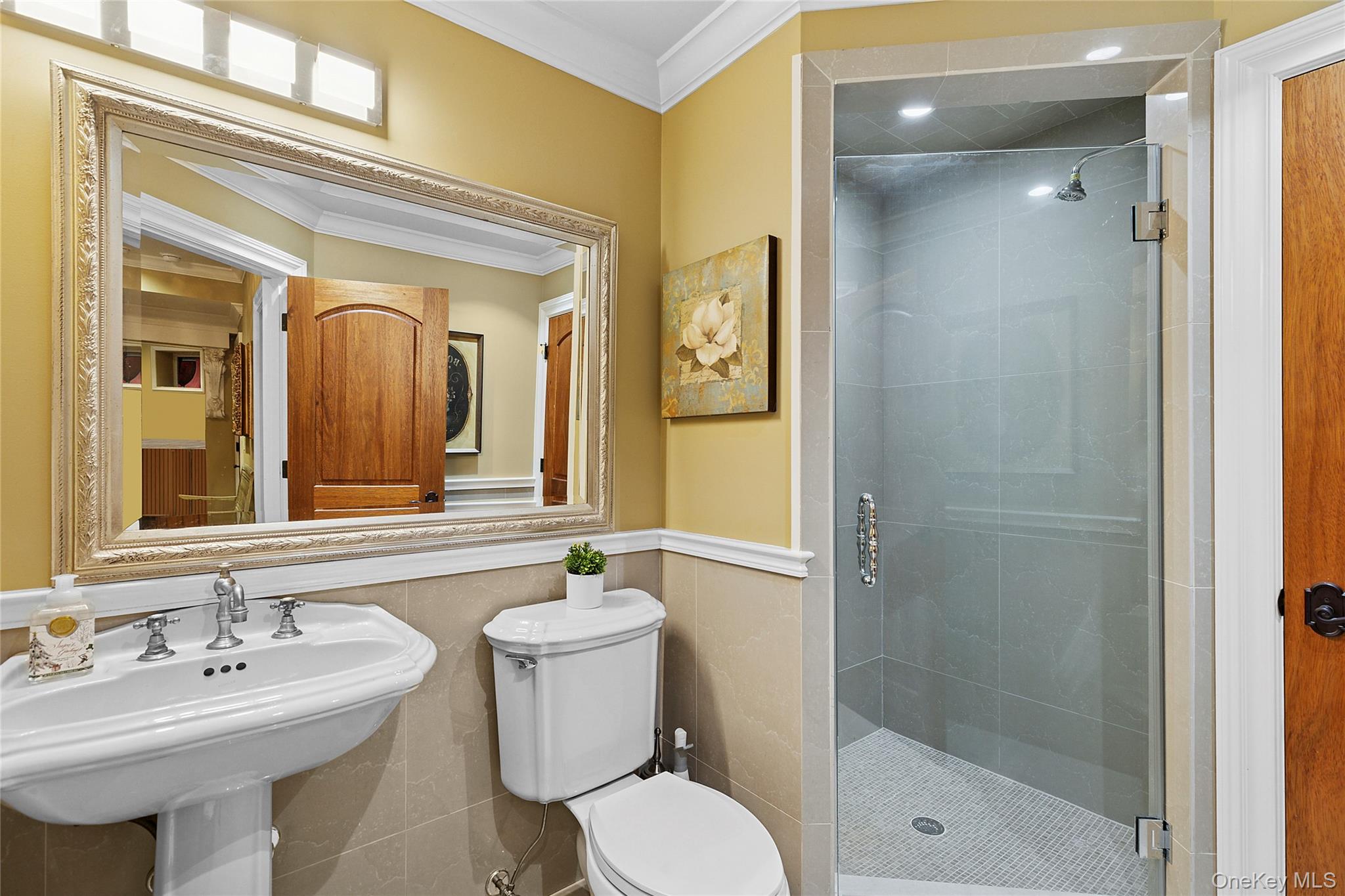 5 Schoolhouse Court Oyster Bay, NY 11771 - Photo 25 of 33 a bathroom with a sink toilet and shower