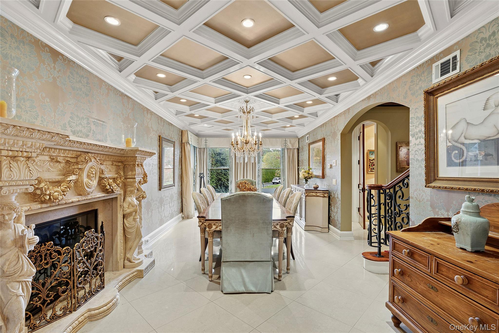5 Schoolhouse Court Oyster Bay, NY 11771 - Photo 5 of 33 a dining room with furniture a fireplace and wooden floor