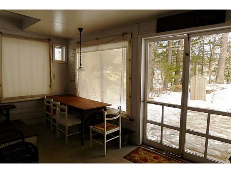 14 Adams Street Wilton, ME 04294 - Photo 16 of 24 Patio/Deck. The screened porch in...