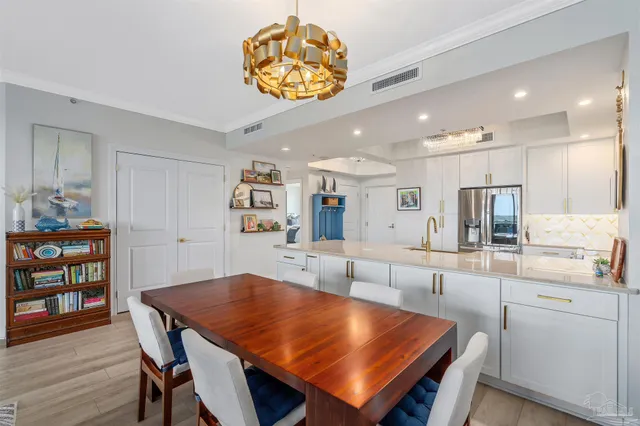 a kitchen with a stove and a sink