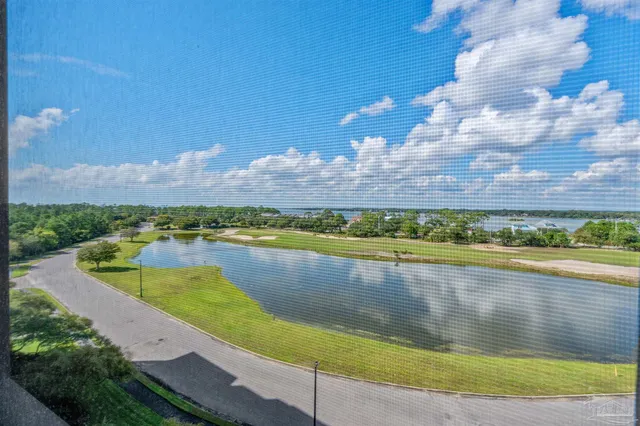 a view of swimming pool with outdoor seating