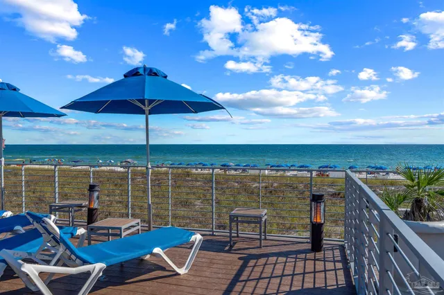 a view of a house with a car parked in it