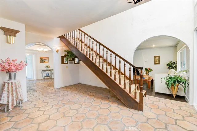 a view of entryway with wooden floor