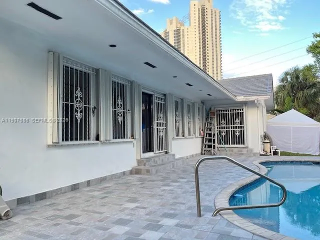 a view of outdoor space yard and swimming pool