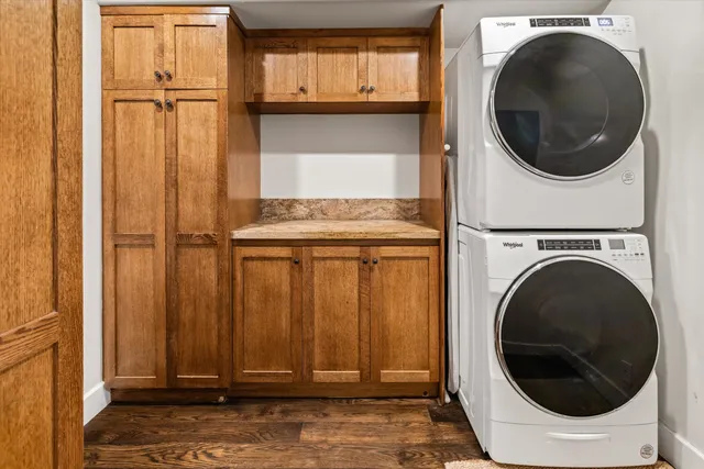 a view of a hallway with washer and dryer