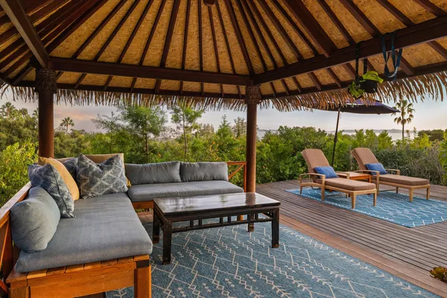 a outdoor living space with furniture and outdoor view