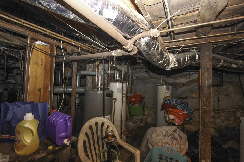 68 Bemis Road Fitchburg, MA 01420 - Photo 15 of 21 a store room with stainless steel appliances and furniture