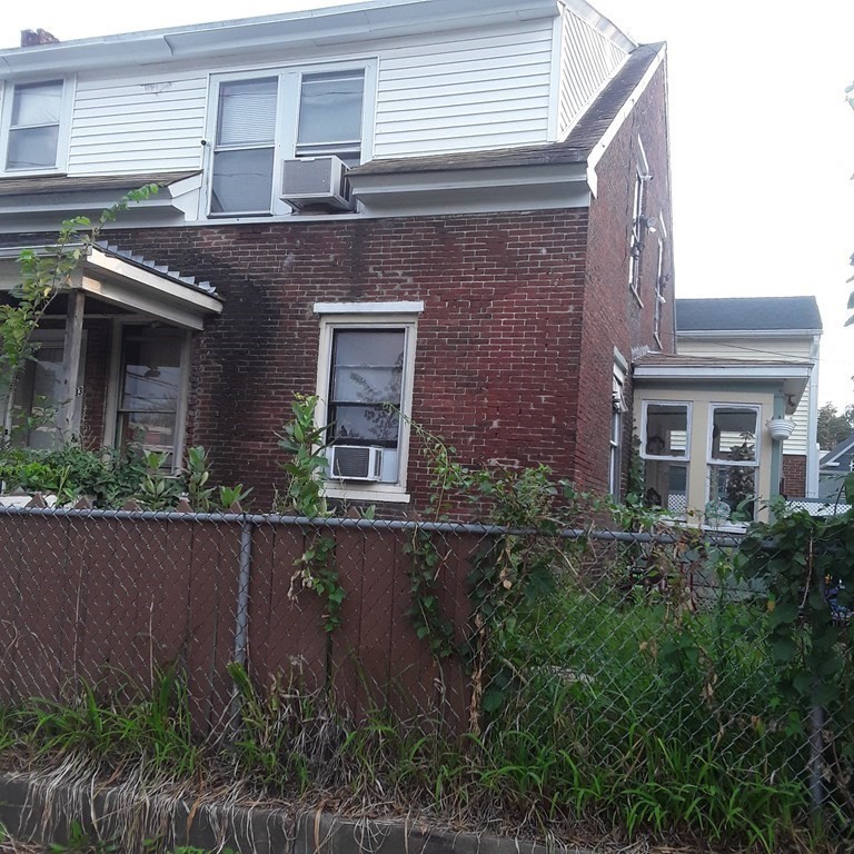 68 Bemis Road Fitchburg, MA 01420 - Photo 19 of 21 front view of a house with potted plants