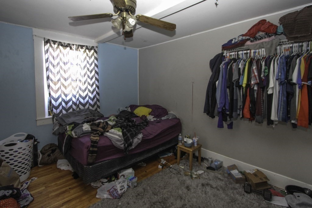 68 Bemis Road Fitchburg, MA 01420 - Photo 9 of 21 a bedroom with a bed and a window
