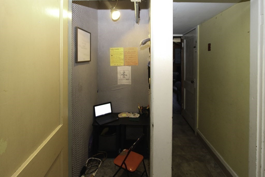 68 Bemis Road Fitchburg, MA 01420 - Photo 10 of 21 a view of a hallway with workspace