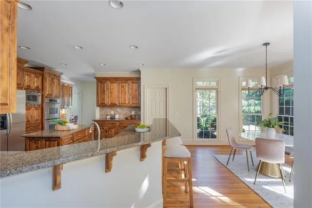 a view of game room with window and furniture