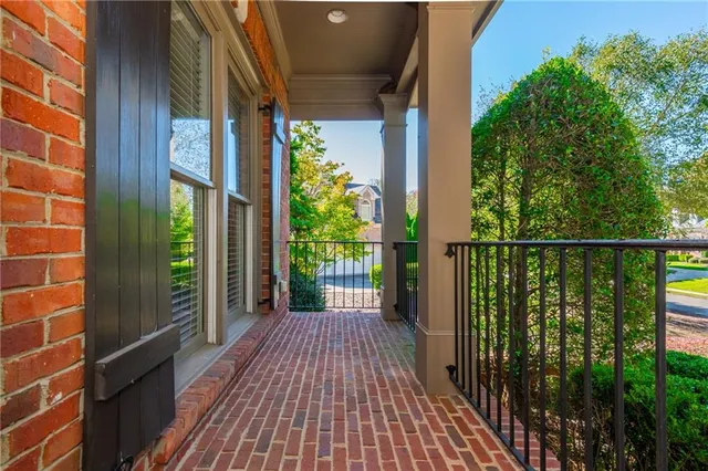 a view of a dining room with wooden floor