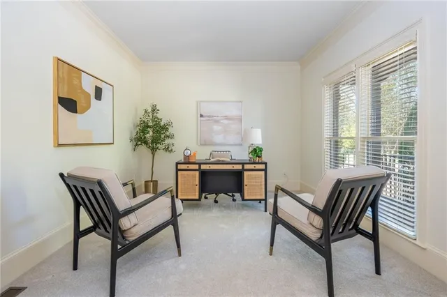 a very nice looking living room with a large window