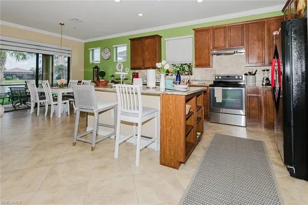 a kitchen with a cabinets and appliances
