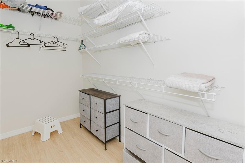 6441 Liberty Street Ave Maria, FL 34142 - Photo 27 of 48 a view of a room with racks on the wall