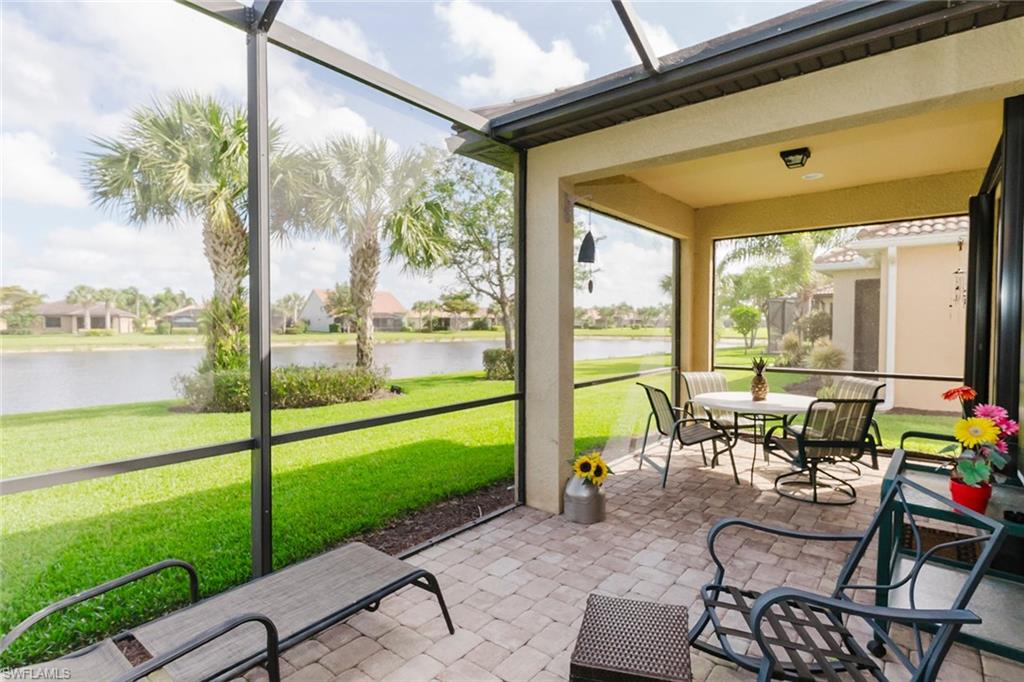 6441 Liberty Street Ave Maria, FL 34142 - Photo 34 of 48 a living room with furniture and garden view