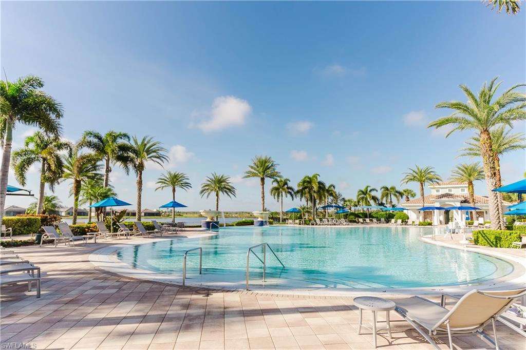6441 Liberty Street Ave Maria, FL 34142 - Photo 47 of 48 a view of outdoor space with trees around