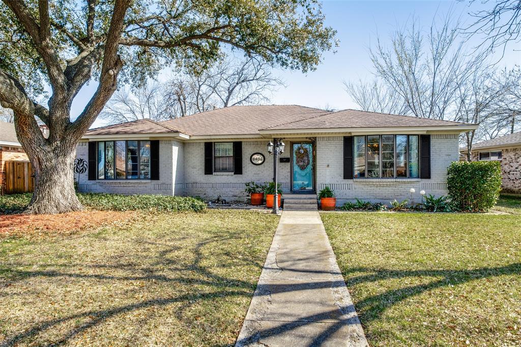 8452 Hunnicut Road Dallas, TX 75228 - Photo 1 of 1 a front view of a house with yard