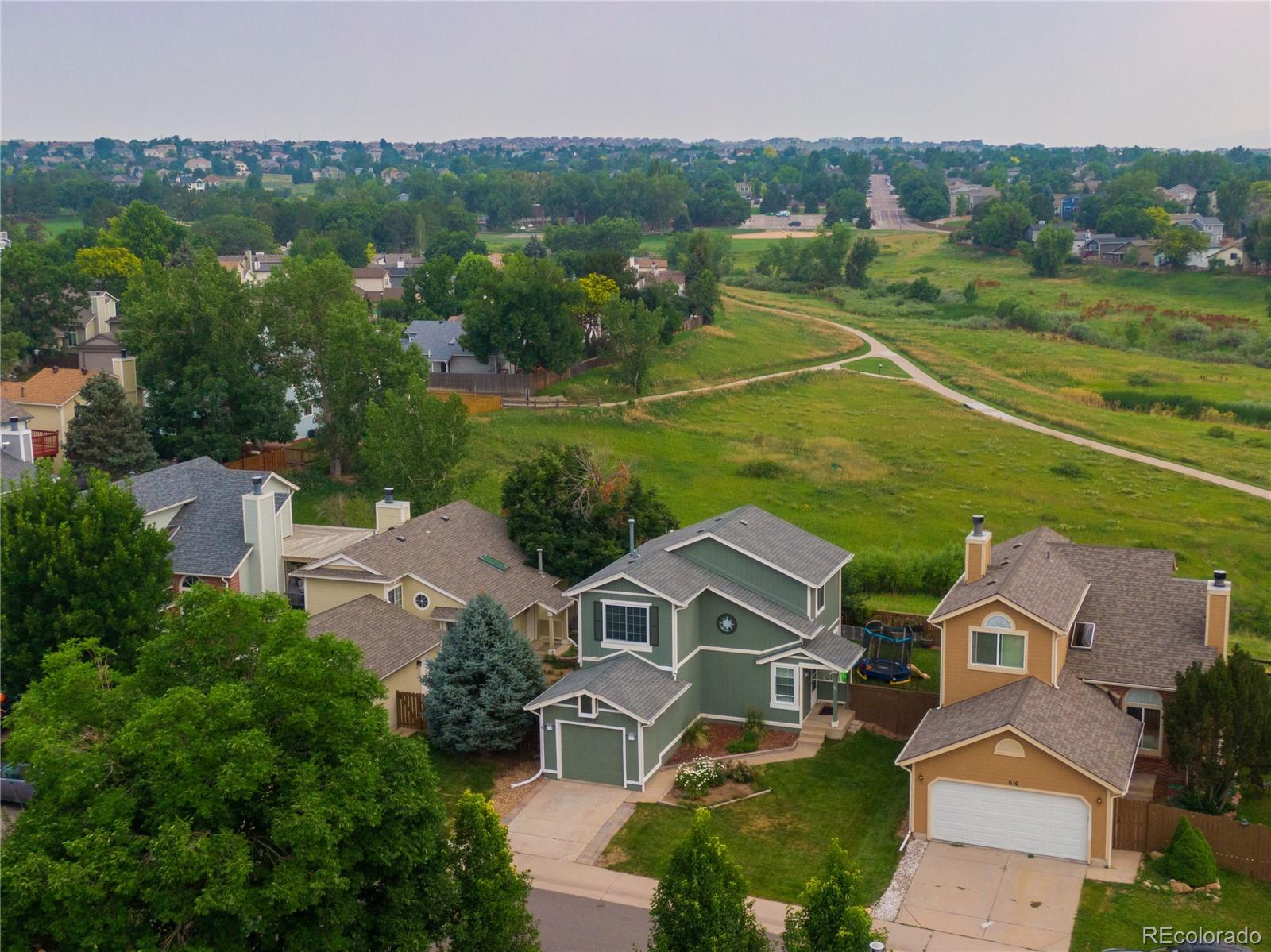 622 Longfellow Lane Highlands Ranch, CO 80126 - Photo 3 of 24 an aerial view of a house