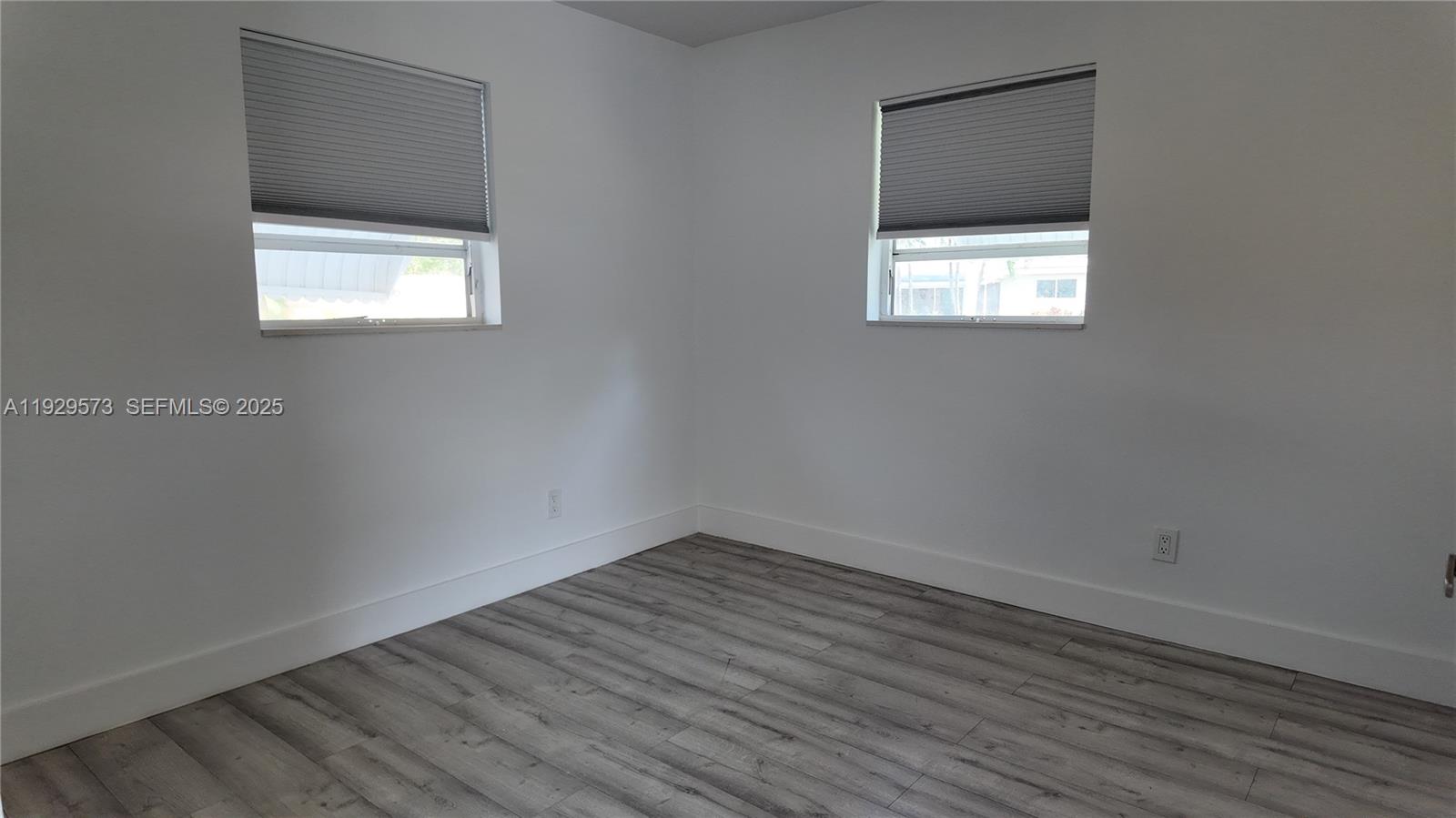 2100 North 57th Way Hollywood, FL 33021 - Photo 20 of 47 an empty room with a window