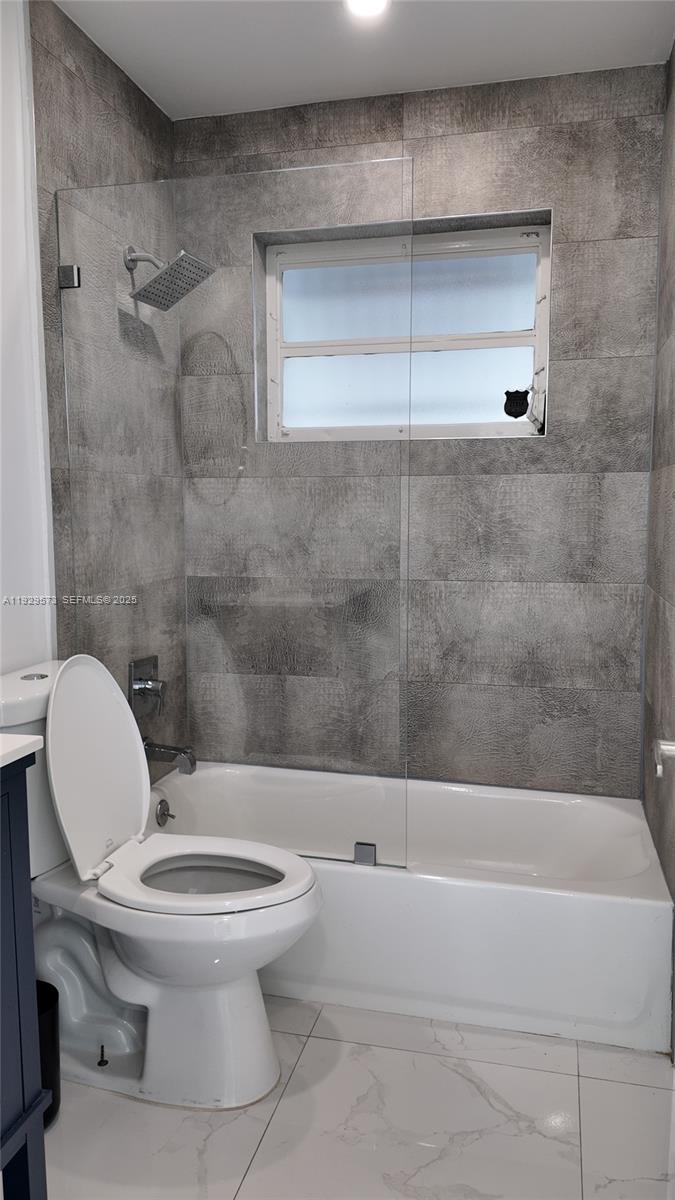 2100 North 57th Way Hollywood, FL 33021 - Photo 23 of 47 a bathroom with a toilet and a shower