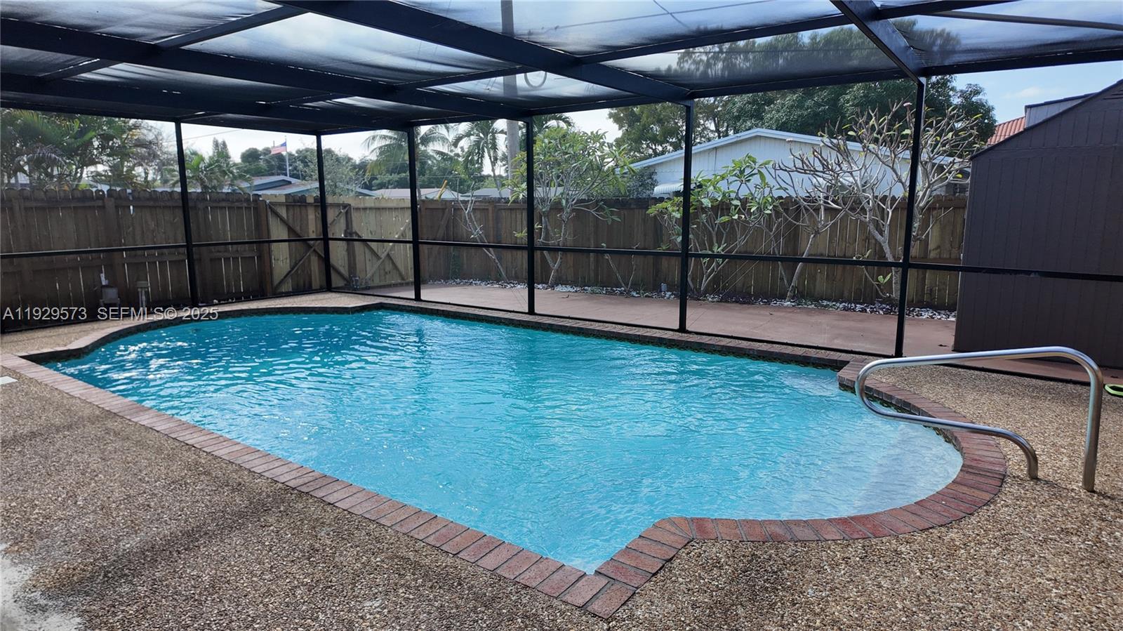 2100 North 57th Way Hollywood, FL 33021 - Photo 35 of 47 a view of a backyard with a swimming pool