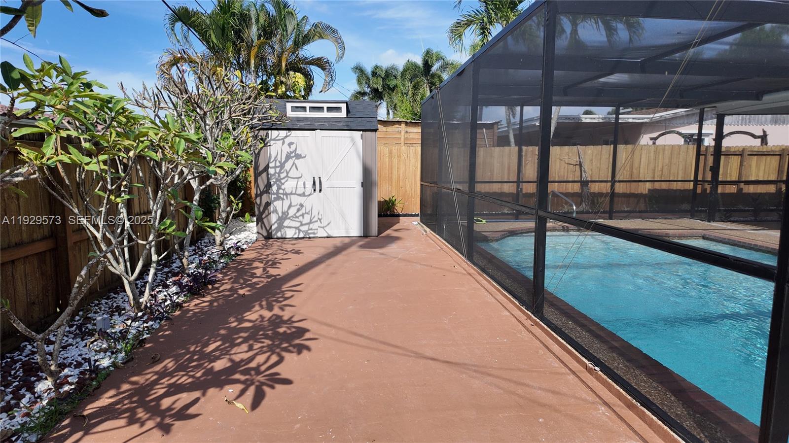 2100 North 57th Way Hollywood, FL 33021 - Photo 38 of 47 a view of swimming pool with a patio