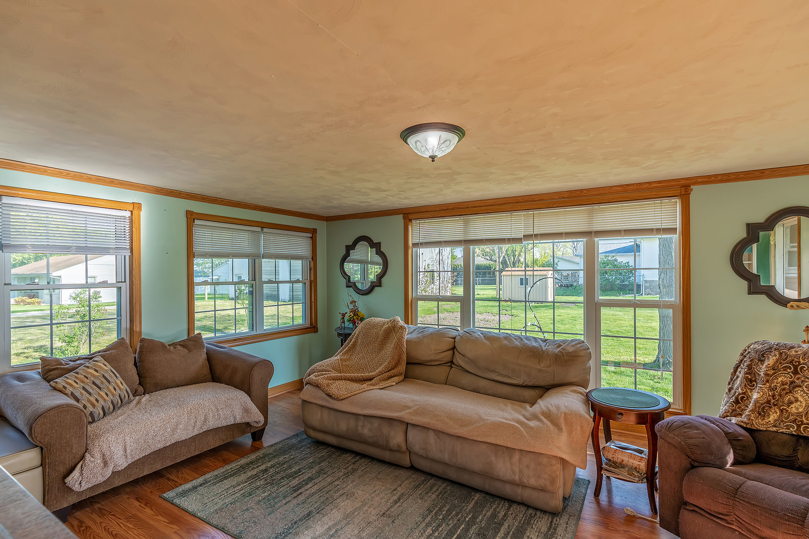 902 Warren Street Chenoa, IL 61726 - Photo 22 of 36 a living room with furniture and a large window