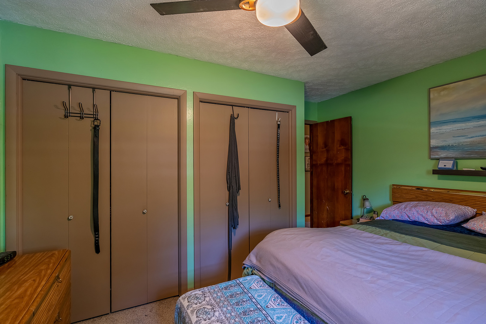 902 Warren Street Chenoa, IL 61726 - Photo 33 of 36 a bedroom with a bed and a dresser