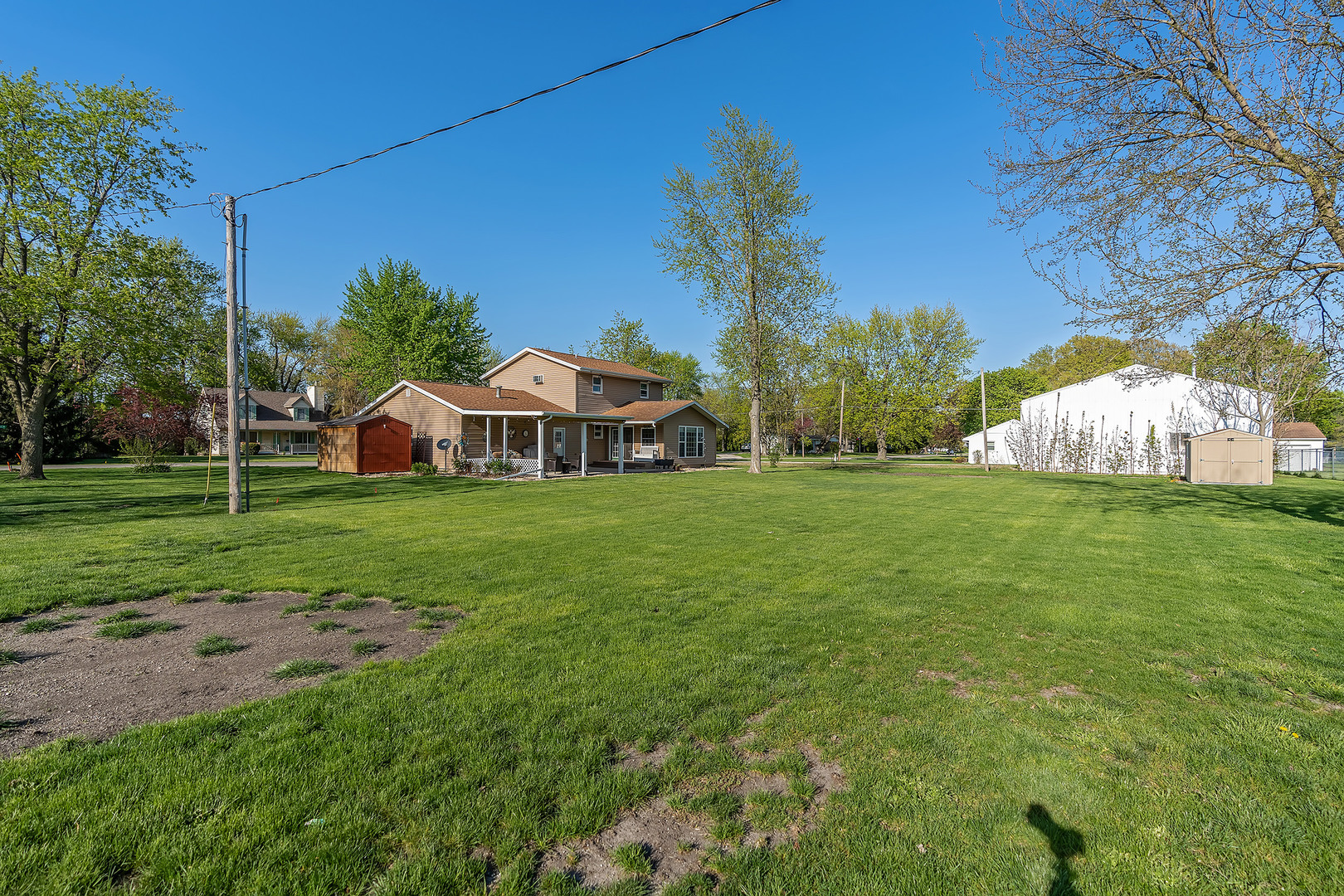 902 Warren Street Chenoa, IL 61726 - Photo 6 of 36 a view of a house with a yard