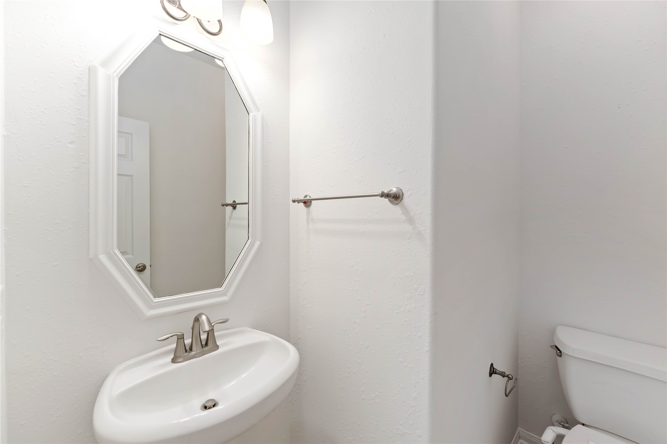 7226 VORGEN Court Spring, TX 77379 - Photo 20 of 43 a bathroom with a sink and a mirror