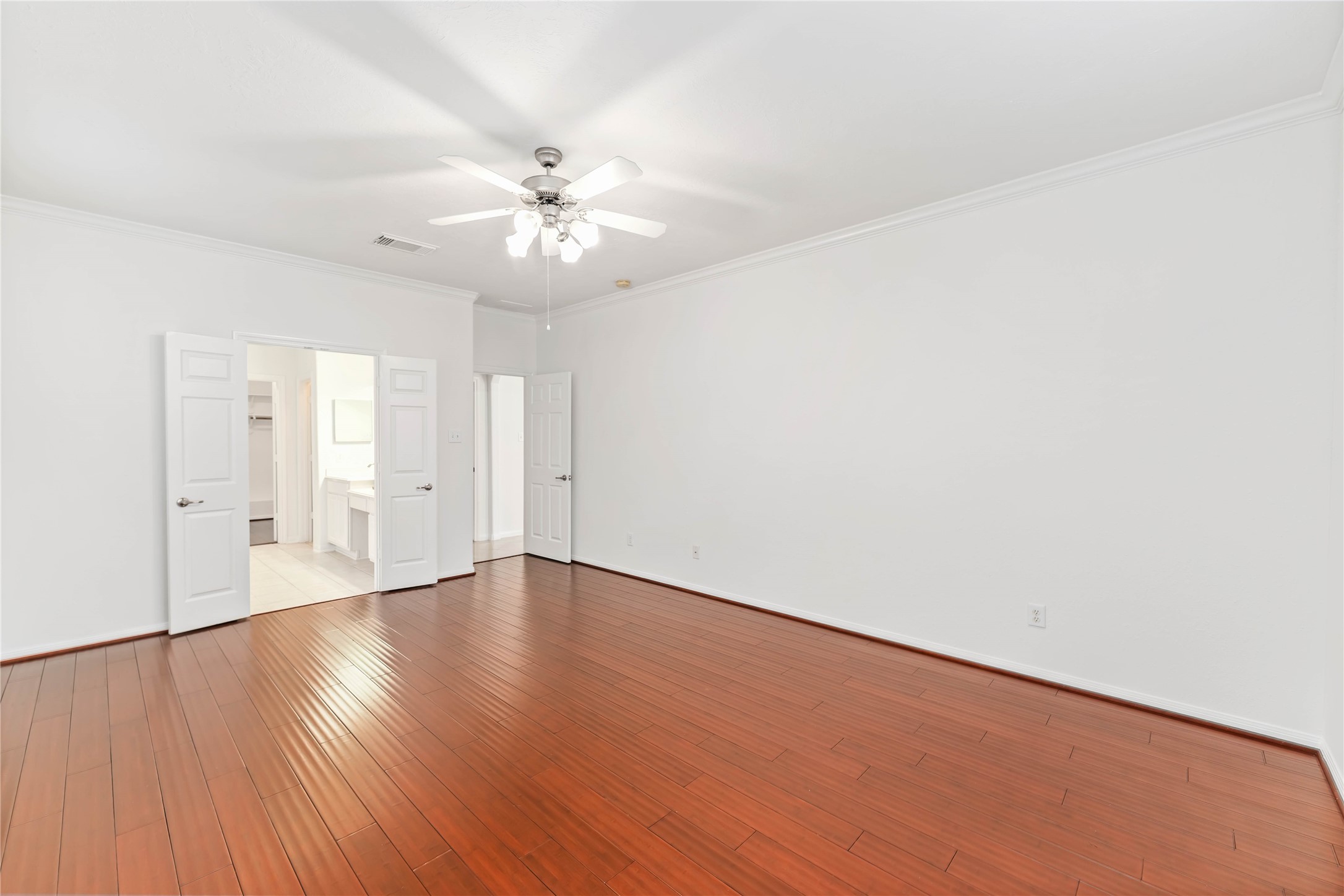 7226 VORGEN Court Spring, TX 77379 - Photo 23 of 43 an empty room with wooden floor and fan