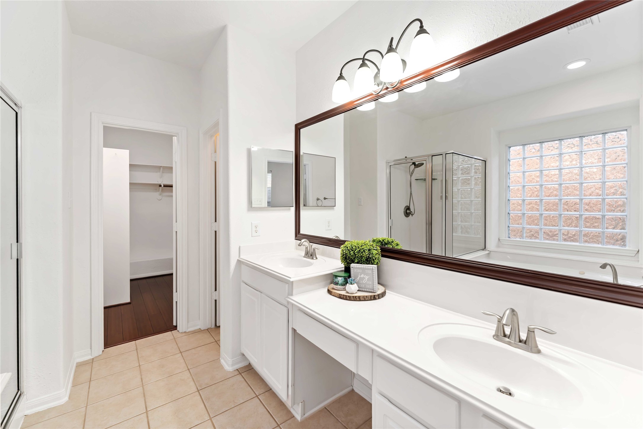 7226 VORGEN Court Spring, TX 77379 - Photo 24 of 43 a bathroom with a sink and a mirror