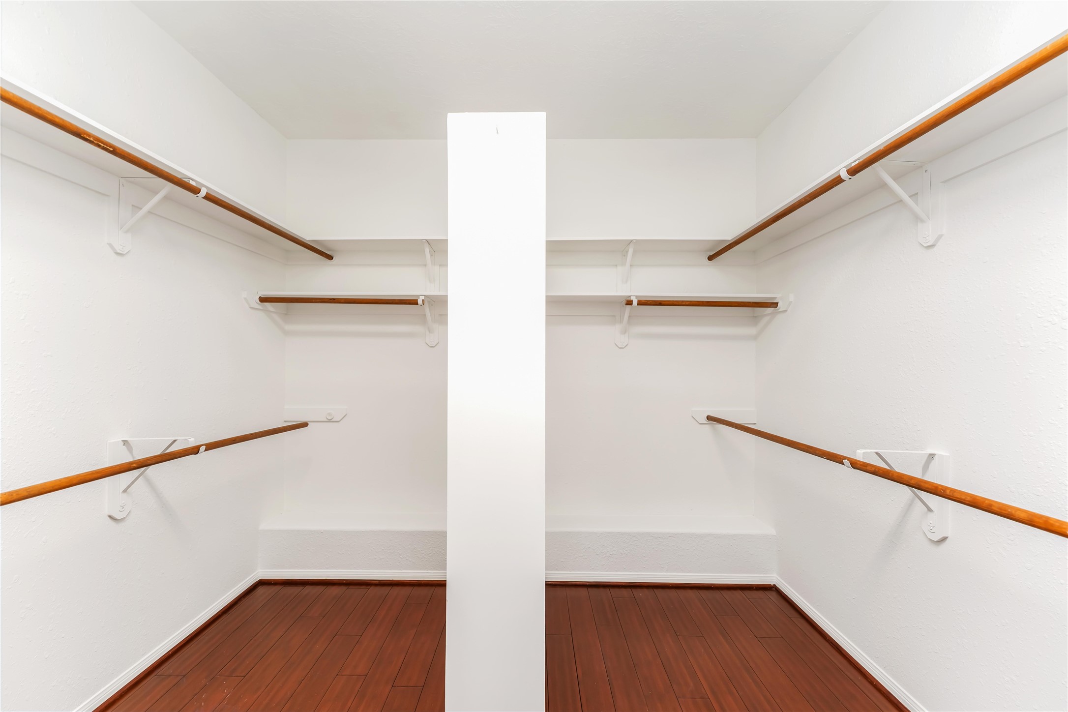 7226 VORGEN Court Spring, TX 77379 - Photo 27 of 43 a view of hallway with stairs and wooden floor