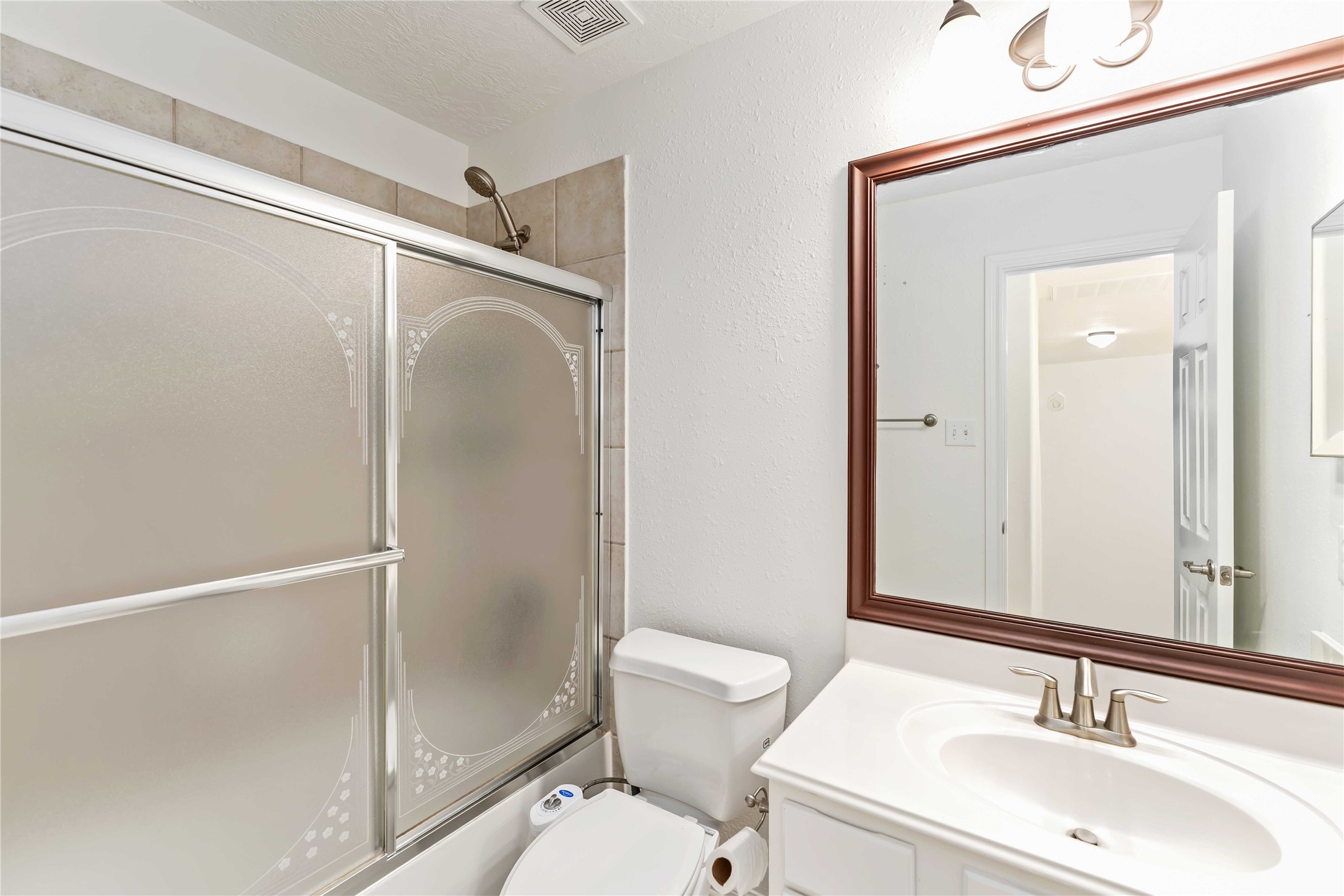 7226 VORGEN Court Spring, TX 77379 - Photo 31 of 43 a bathroom with a sink toilet and shower