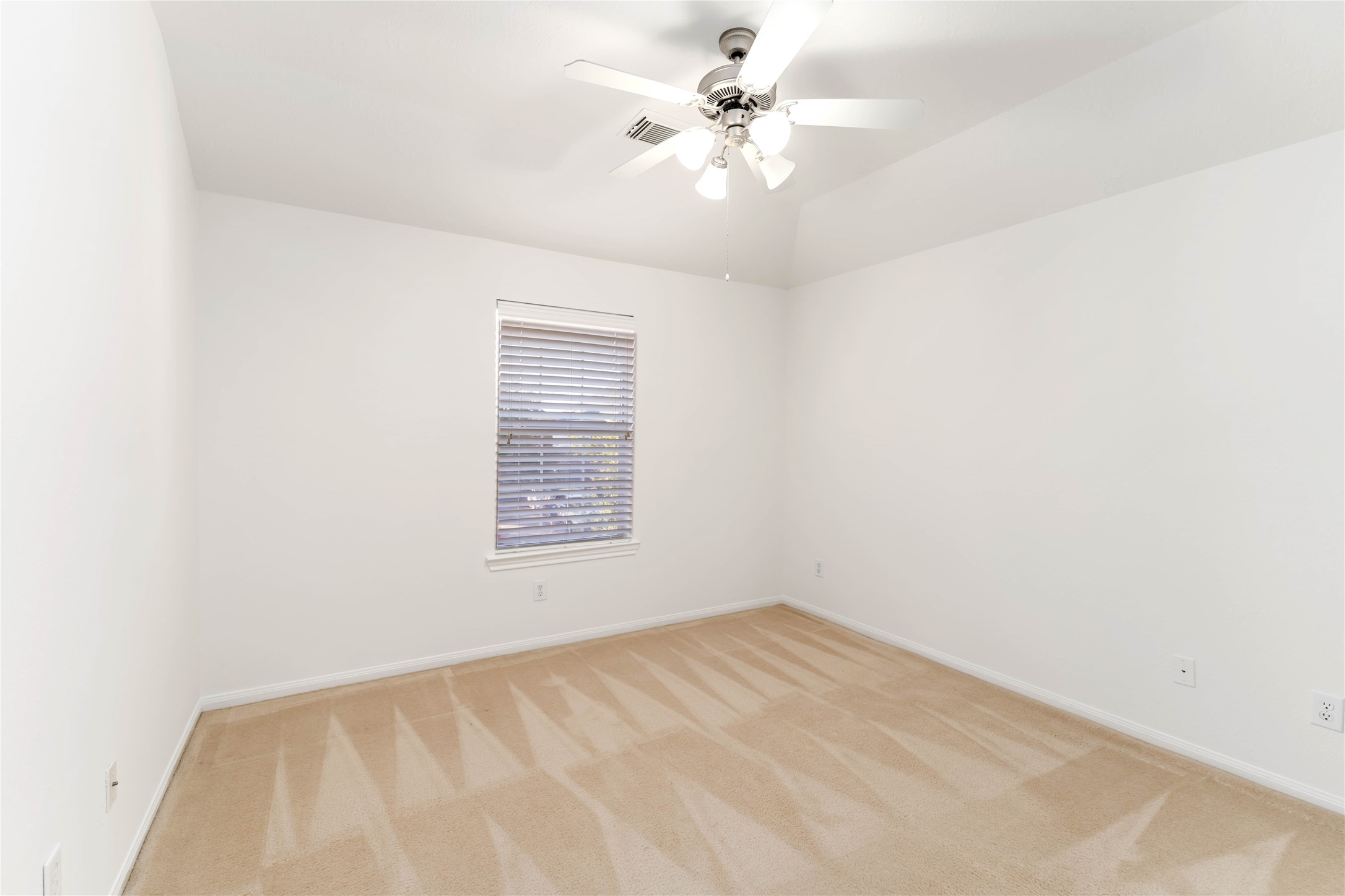 7226 VORGEN Court Spring, TX 77379 - Photo 38 of 43 an empty room with a fan & a window