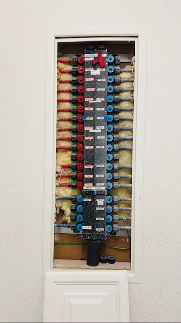 7226 VORGEN Court Spring, TX 77379 - Photo 40 of 43 PEX plumbing manifold system. It works like a breaker panel but for your home's water line. Each line runs directly to a specific fixture. The knobs allow you to shut off water to individual fixtures without affecting the rest of the house.