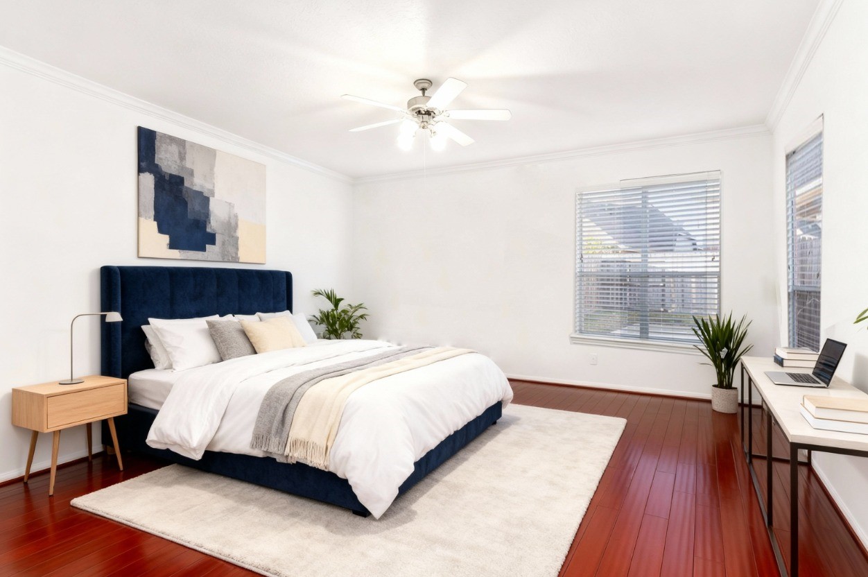 7226 VORGEN Court Spring, TX 77379 - Photo 4 of 43 a bedroom with a large bed and a window