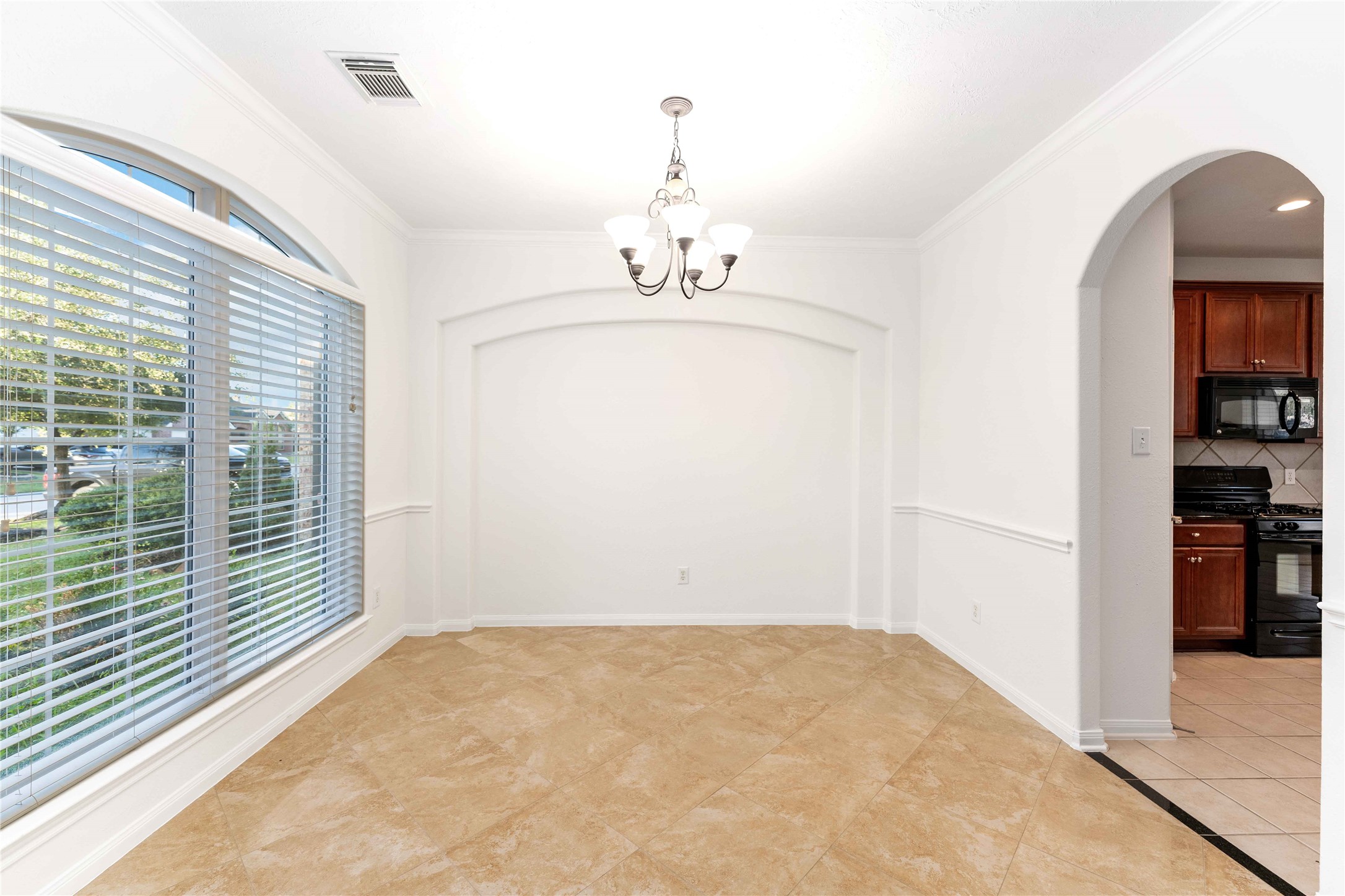 7226 VORGEN Court Spring, TX 77379 - Photo 10 of 43 a view of a livingroom with wooden floor and windows