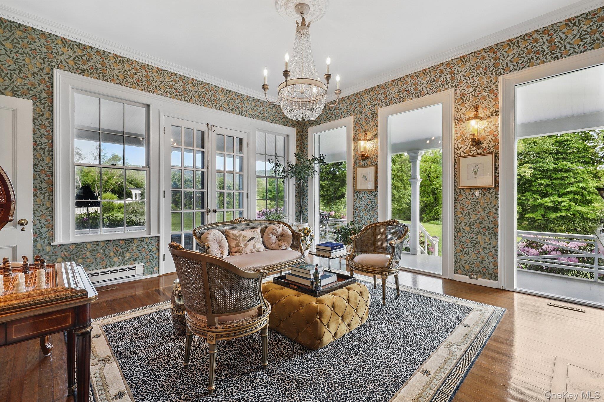 16 State School Road Warwick, NY 10990 - Photo 11 of 50 a dining room with furniture a chandelier and wooden floor