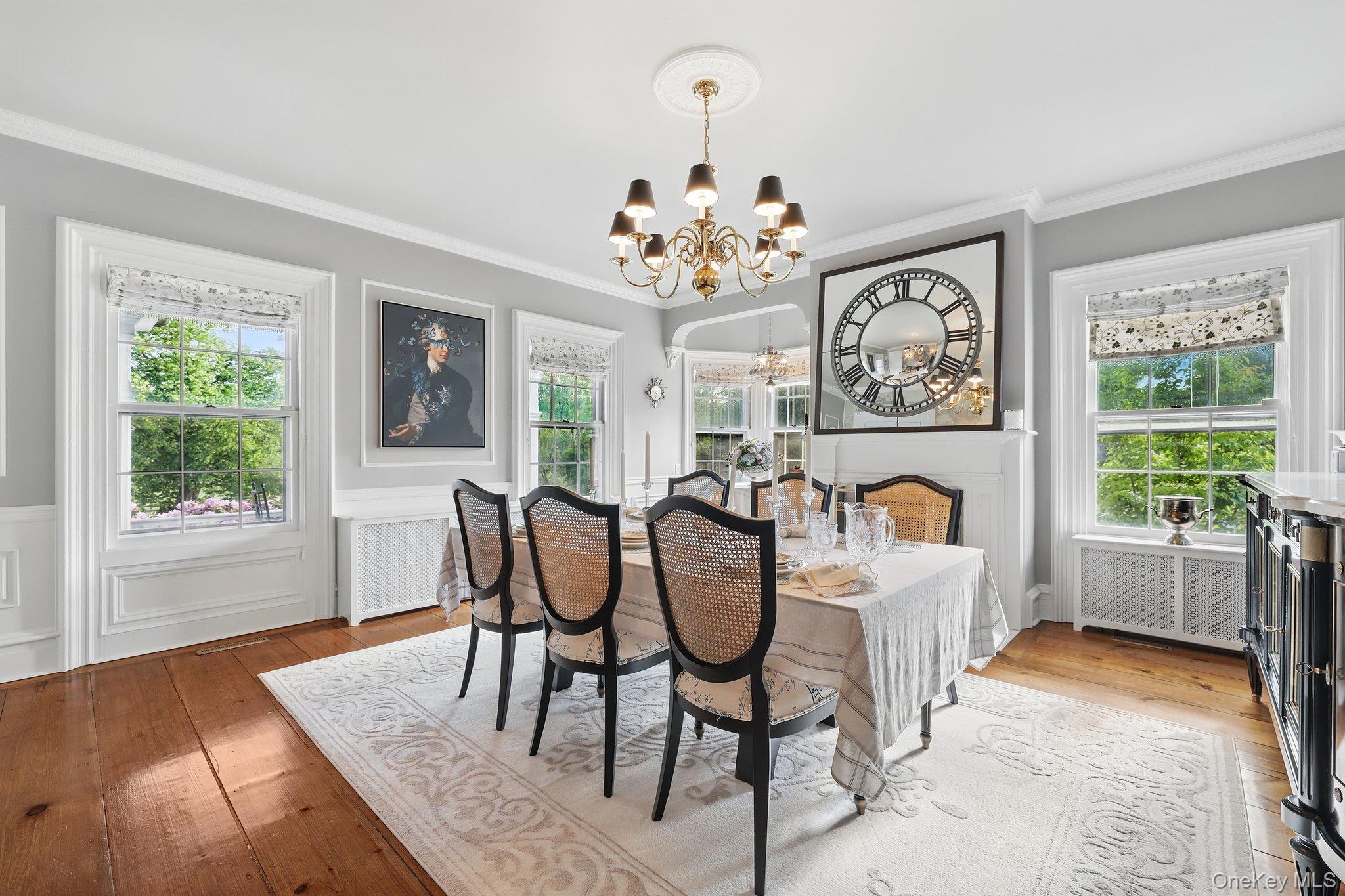 16 State School Road Warwick, NY 10990 - Photo 13 of 50 a view of a dining room with furniture a chandelier and wooden floor