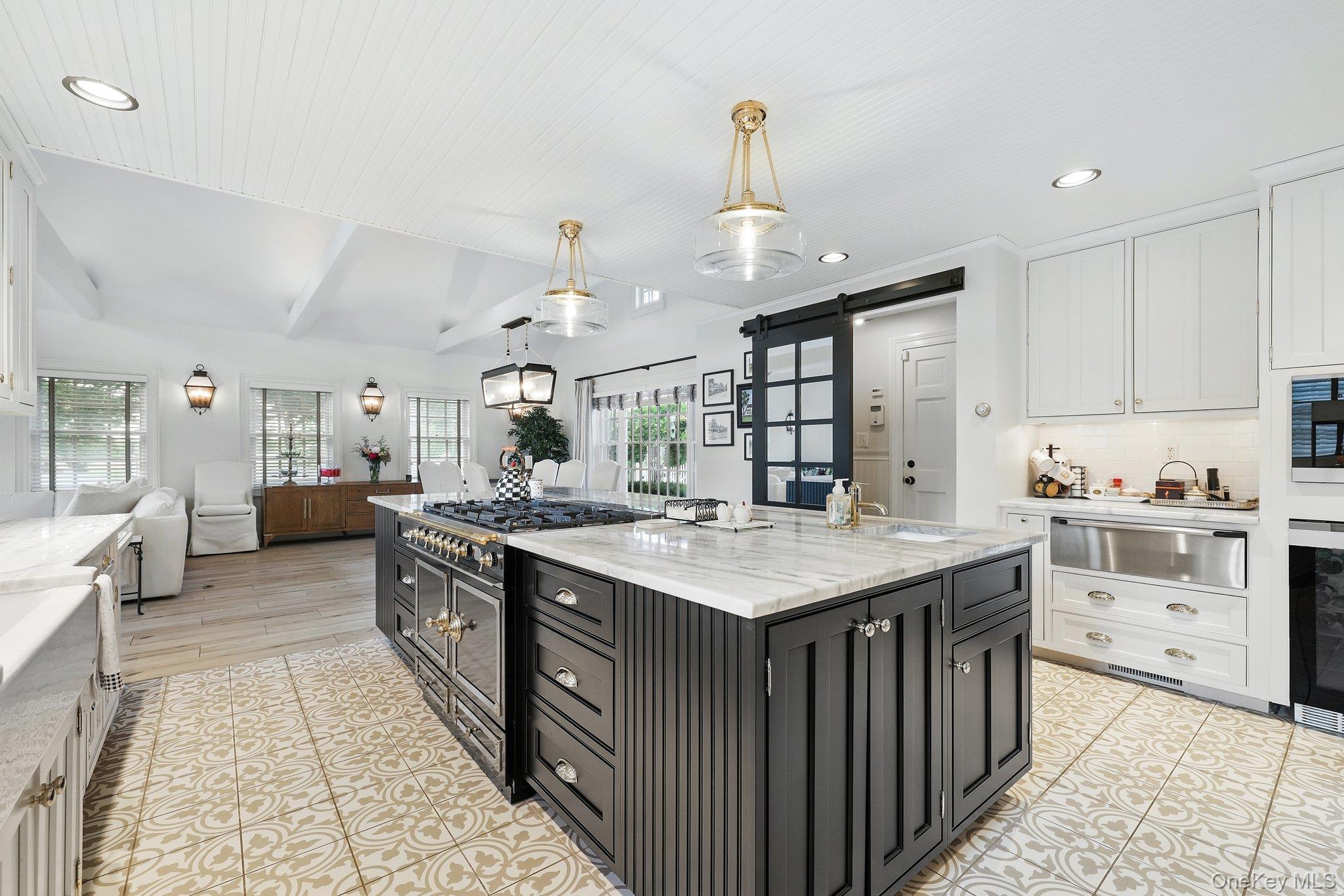 16 State School Road Warwick, NY 10990 - Photo 15 of 50 a kitchen with granite countertop a sink stove and cabinets