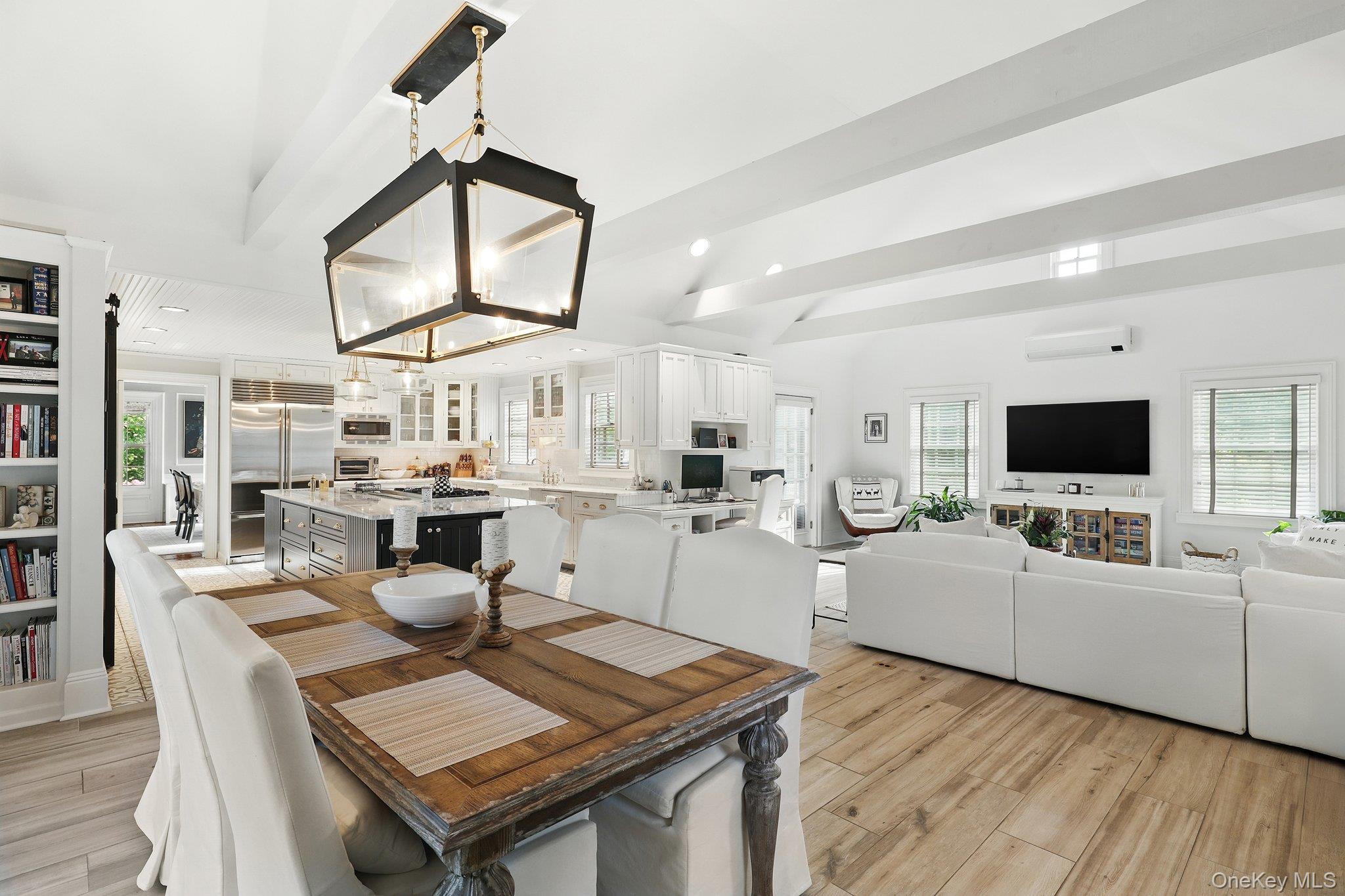 16 State School Road Warwick, NY 10990 - Photo 19 of 50 a living room with lots of furniture and a flat screen tv