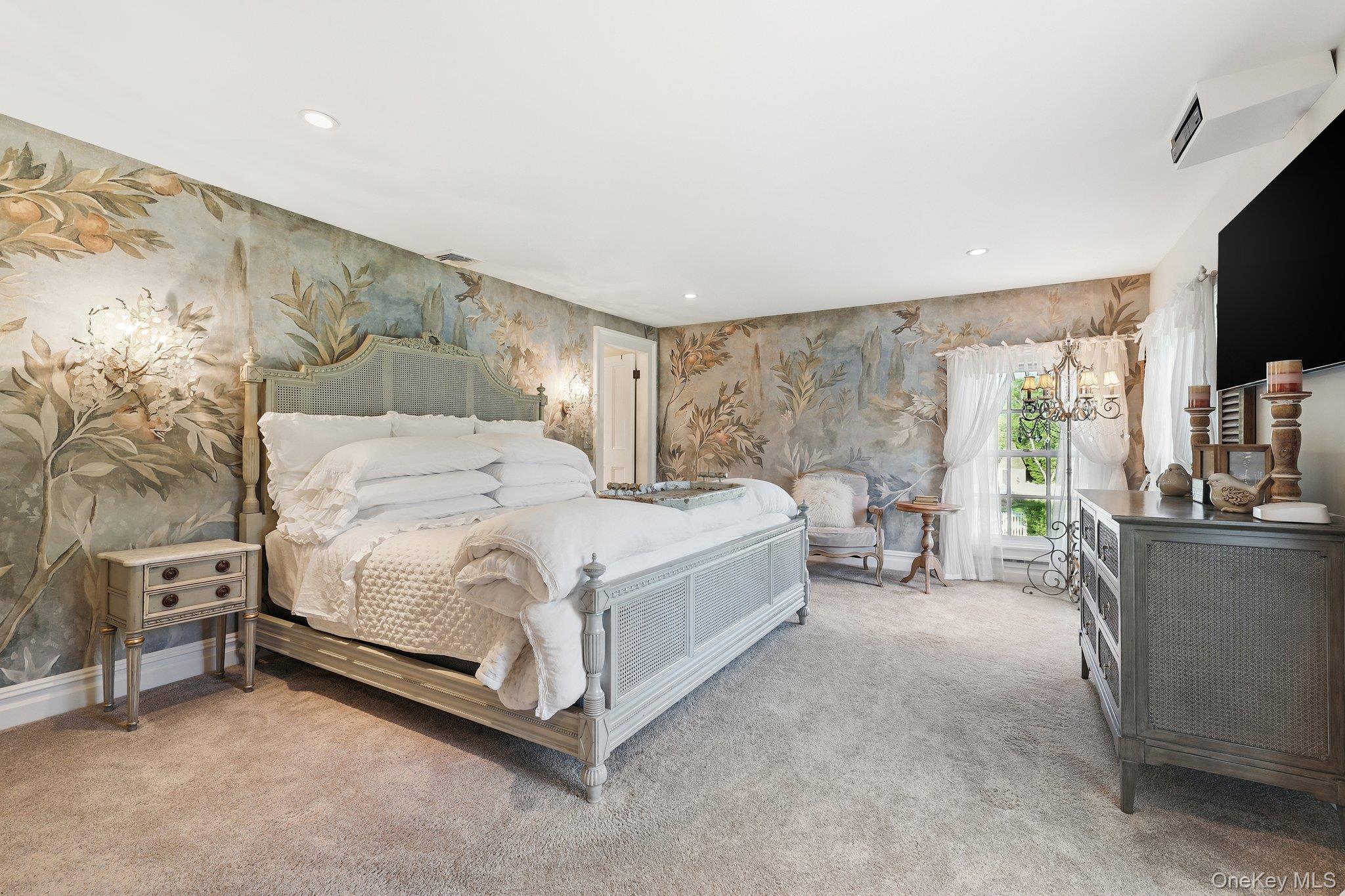 16 State School Road Warwick, NY 10990 - Photo 21 of 50 a bedroom with a bed couch tv and a large window